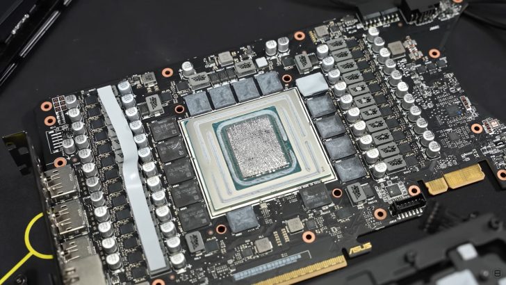 A detailed view of an ASUS graphics card PCB featuring the NVIDIA GPU at the center surrounded by capacitors and memory chips.