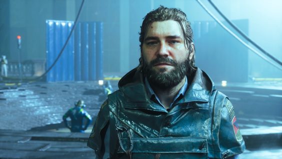 A character in 'CONTROL Resonant' standing in a dimly lit industrial setting with wet surfaces and a blue raincoat.
