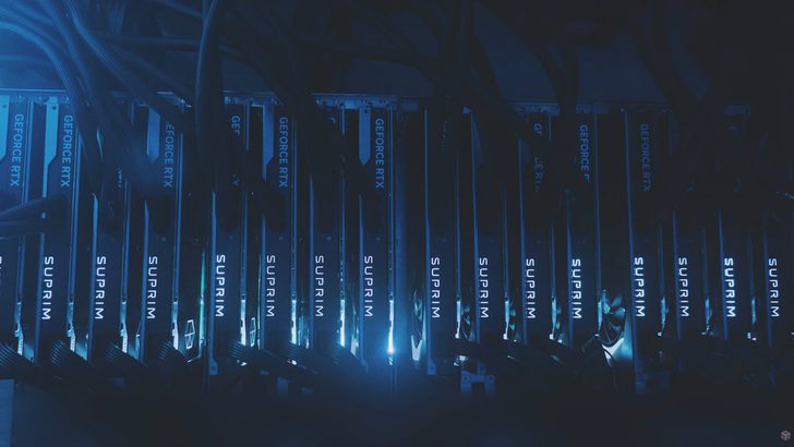 A row of NVIDIA GeForce RTX GPUs with 'SUPRIM' branding, illuminated in blue.