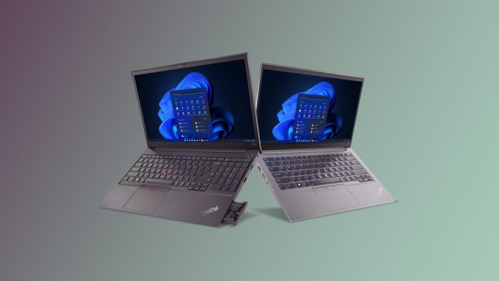 Two Lenovo ThinkPad laptops with Windows 11 logo displayed on their screens are shown side by side.