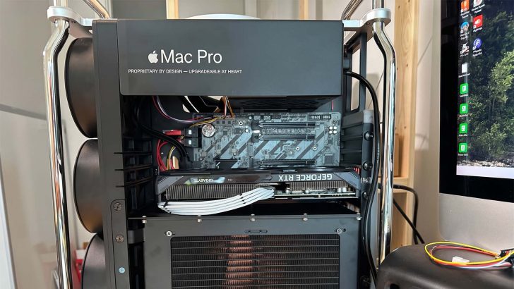 An Apple Mac Pro with a visible NVIDIA GeForce RTX graphics card installed inside the case.