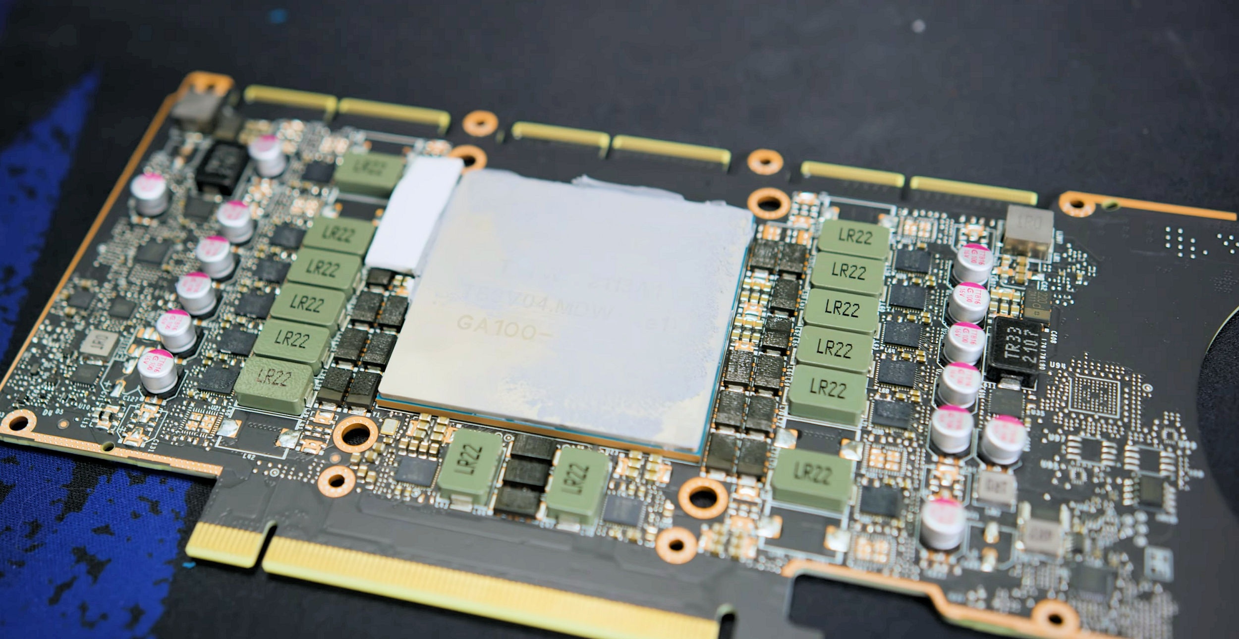 Close-up of an NVIDIA GA100 GPU with visible components labeled